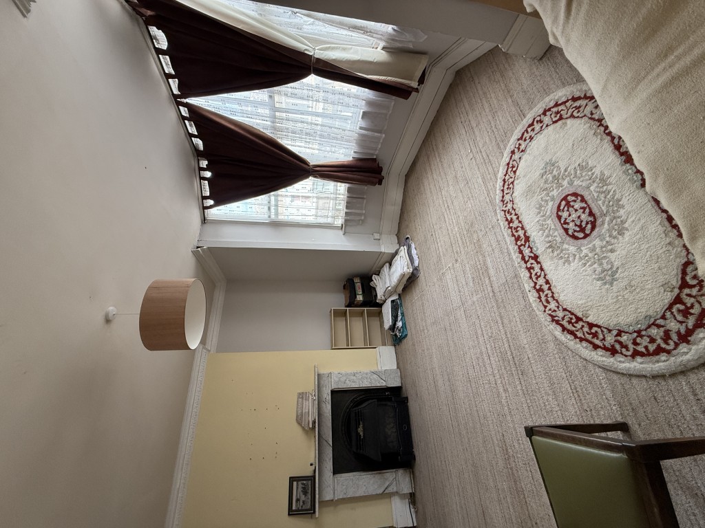 Lot: 44 - MIXED RESIDENTIAL AND COMMERCIAL BUILDING WITH POTENTIAL - Alternate view of living room with bay window and marble fireplace